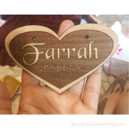 Customized Braille raised wooden heart shaped logo